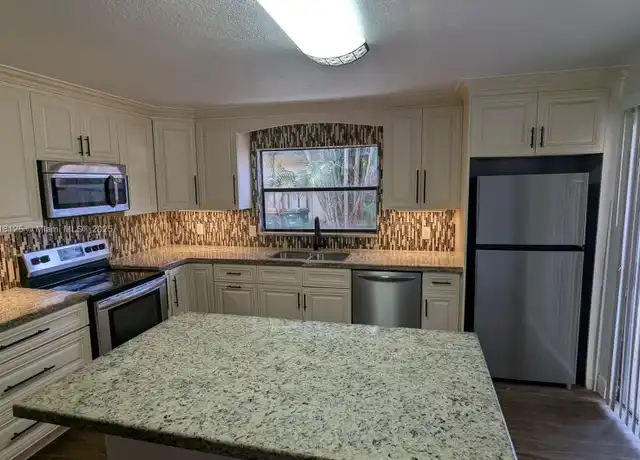 Property at 5825 Swordfish Ct Unit A, Tamarac, FL, 33319, 2 beds, 2.5 baths, [object Object]