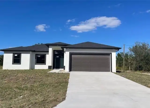 Property at 302 W 8th St, Lehigh Acres, FL, 33972, 4 beds, 2 baths, [object Object]