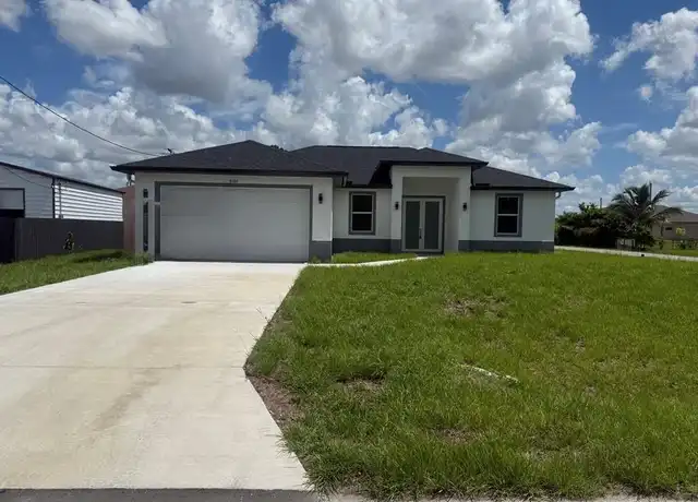 Property at 4102 16th St SW, Lehigh Acres, FL, 33976, 3 beds, 2 baths, [object Object]