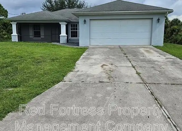 Property at 3224 57th St W, Lehigh Acres, FL, 33971, 3 beds, 2 baths, [object Object]