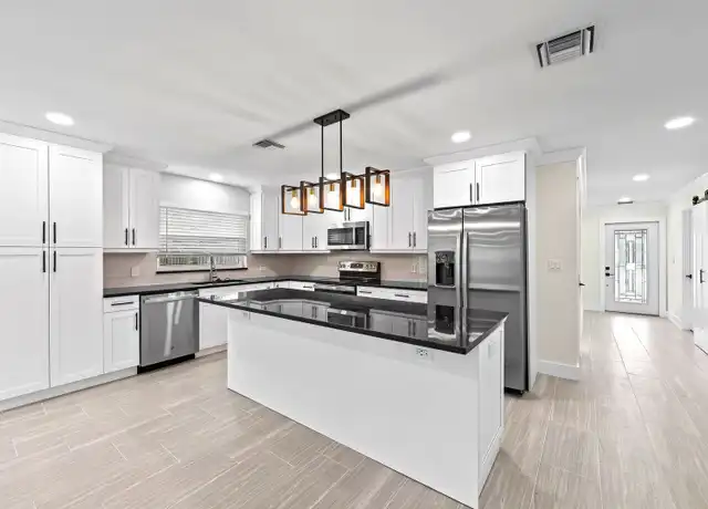 Property at 548 93rd Ave N, Naples, FL, 34108, 3 beds, 2 baths, [object Object]