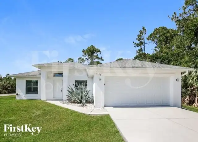 Property at 2718 26th St W, Lehigh Acres, FL, 33971, 3 beds, 2 baths, [object Object]