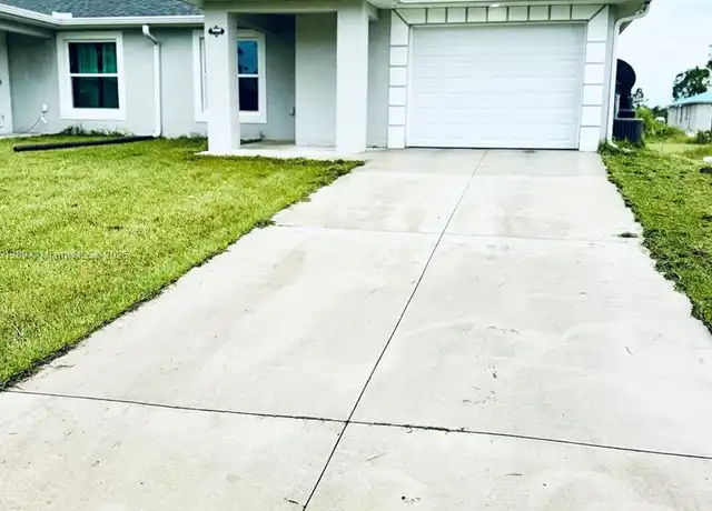 Property at 1110 Augusta St E Unit 1110, Lehigh Acres, FL, 33974, 3 beds, 2 baths, [object Object]