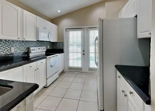 Property at 927 Stanton Dr, Weston, FL, 33326, 3 beds, 2 baths, [object Object]