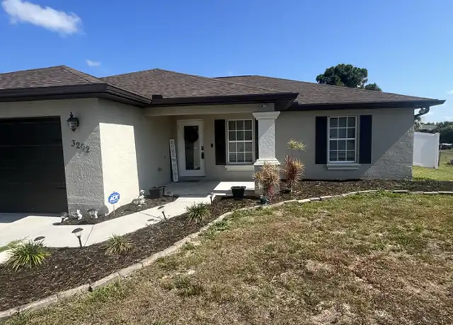 Property at 3202 57th St W, Lehigh Acres, FL, 33971, 4 beds, 2 baths, [object Object]