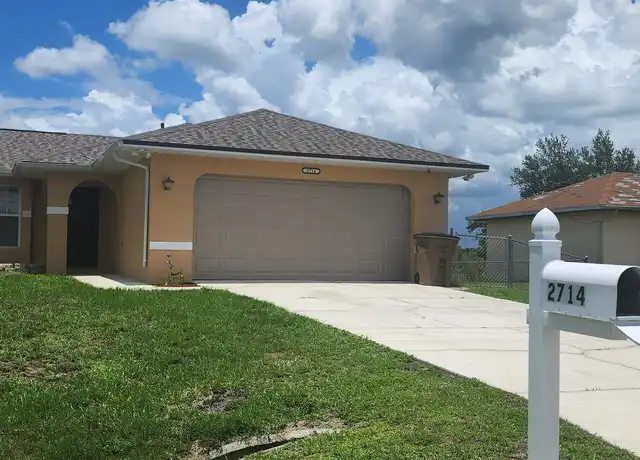 Property at 2714 69th St W, Lehigh Acres, FL, 33971, 3 beds, 2 baths, [object Object]