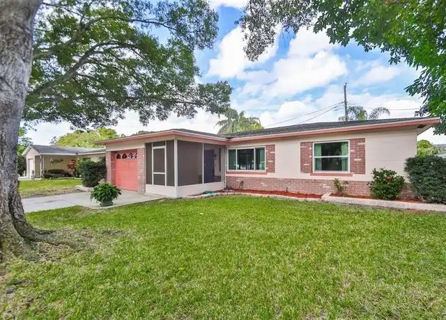 Property at 5589 46th Ave N, Kenneth City, FL, 33709, 4 beds, 2 baths, [object Object]