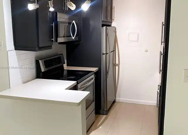 Property at 633 S Royal Poinciana Blvd Unit A106, Miami Springs, FL, 33166, 1 bed, 1 bath, [object Object]