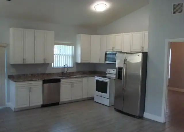 Property at 317 Jennings Ave, Greenacres, FL, 33463, 4 beds, 2 baths, [object Object]