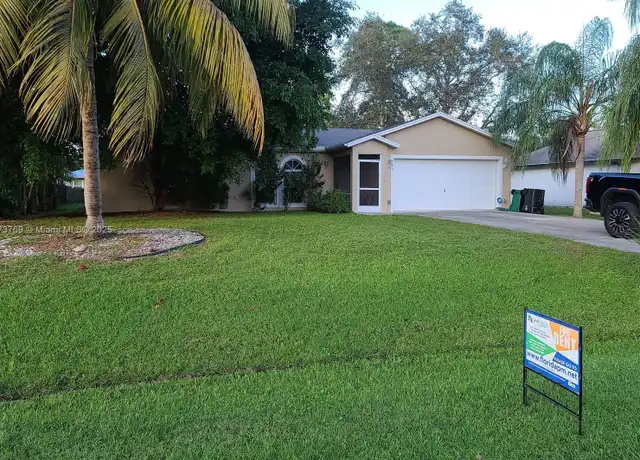 Property at 729 SE Lansdowne Ave, Port Saint Lucie, FL, 34983, 3 beds, 2 baths, [object Object]