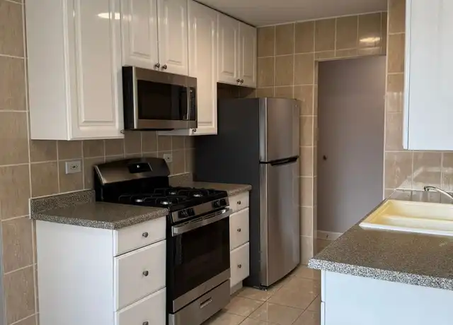 Property at 8623 W Foster Ave Unit 3A, Chicago, IL, 60656, 2 beds, 2 baths, [object Object]