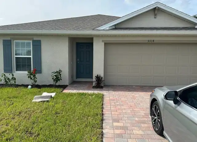 Property at 3318 26th St SW, Lehigh Acres, FL, 33976, 4 beds, 2 baths, [object Object]