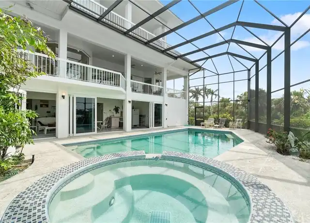 Property at 90 Southport Cv, Bonita Springs, FL, 34134, 4 beds, 6 baths, [object Object]