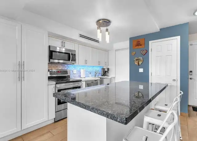 Property at 3026 Center St, Miami, FL, 33133, 2 beds, 2.5 baths, [object Object]