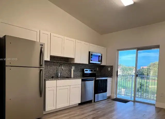Property at 6900 NW 179th St Unit 100-2, Hialeah, FL, 33015, 3 beds, 2 baths, [object Object]