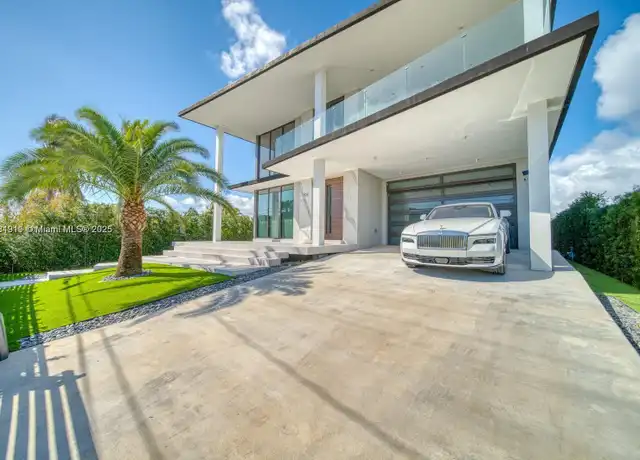 Property at 7520 W Treasure Dr, North Bay Village, FL, 33141, 5 beds, 5.5 baths, [object Object]