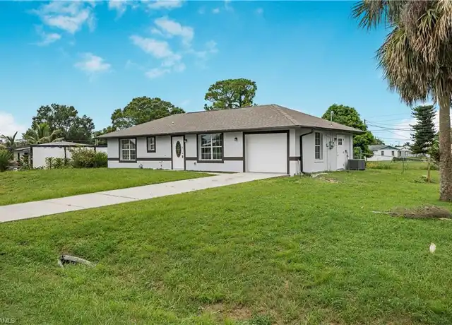 Property at 803 Monroe Dr, Lehigh Acres, FL, 33936, 3 beds, 2 baths, [object Object]
