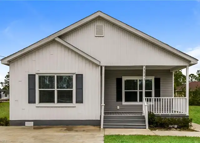 Property at 1111 Morton St E, Lehigh Acres, FL, 33974, 4 beds, 2.5 baths, [object Object]