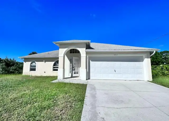 Property at 3412 27th St SW, Lehigh Acres, FL, 33976, 3 beds, 2 baths, [object Object]