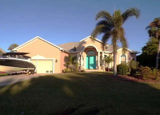 Property at 309 Skylark Ln NW, Port Charlotte, FL, 33952, 3 beds, 2 baths, [object Object]