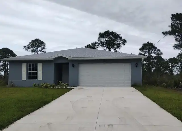 Property at 3102 69th St W, Lehigh Acres, FL, 33971, 4 beds, 2 baths, [object Object]