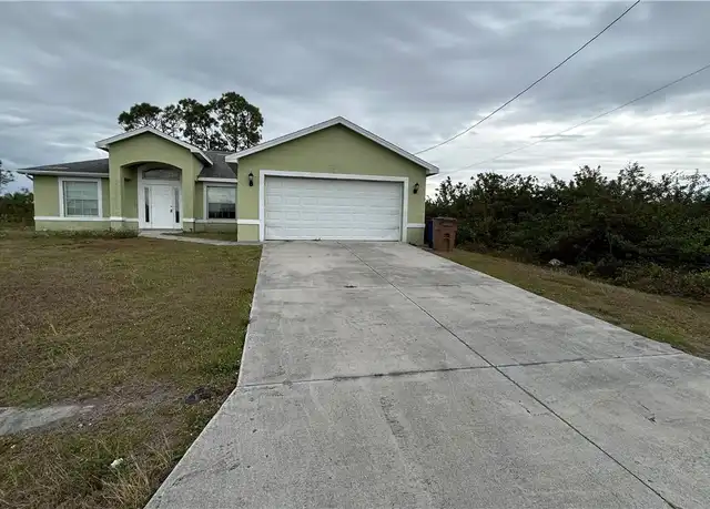 Property at 2906 24th St SW, Lehigh Acres, FL, 33976, 3 beds, 2 baths, [object Object]