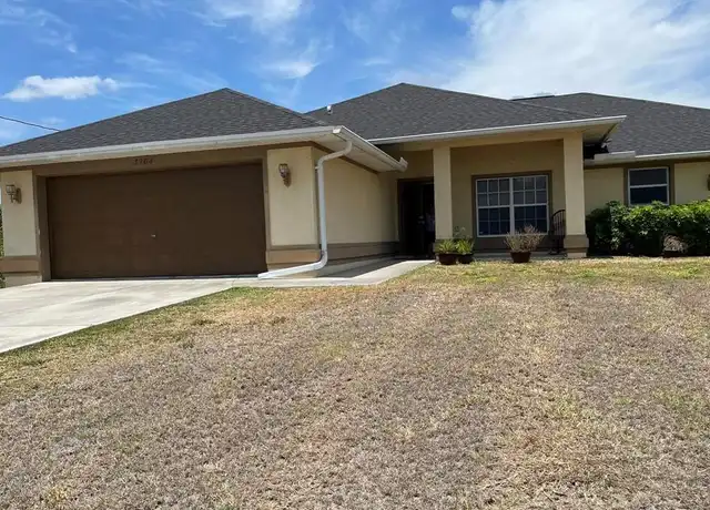 Property at 3204 35th St SW, Lehigh Acres, FL, 33976, 4 beds, 2 baths, [object Object]