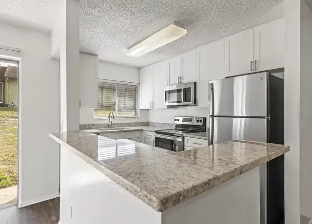 Property at Metro Village Apartments - 222 N Hiawassee Rd, Orlando, FL, 32835, 2 beds, 1-2 bath, [object Object]