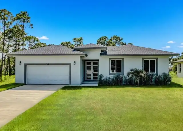Property at 768 Gaylord Ave S, Lehigh Acres, FL, 33974, 3 beds, 2.5 baths, [object Object]