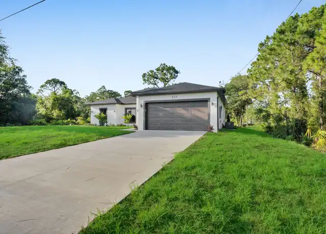Property at 848 Calumet St E, Lehigh Acres, FL, 33974, 4 beds, 2 baths, [object Object]
