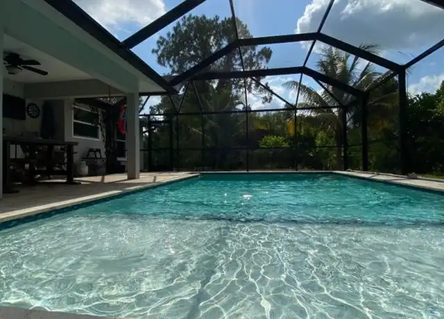 Property at 4015 1st St SW, Lehigh Acres, FL, 33976, 3 beds, 2 baths, [object Object]