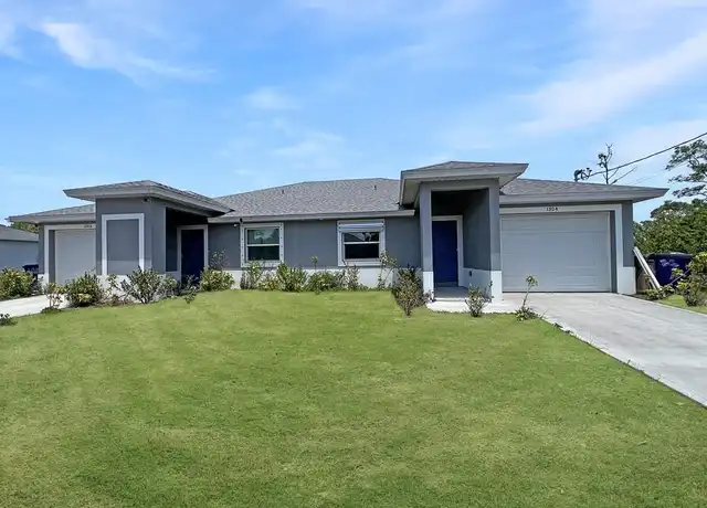 Property at 1304 W 12th St, Lehigh Acres, FL, 33972, 3 beds, 2 baths, [object Object]