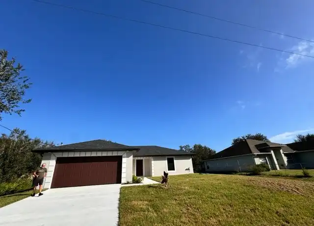 Property at 2608 64th St W, Lehigh Acres, FL, 33971, 3 beds, 2 baths, [object Object]