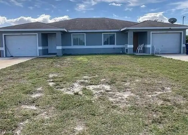 Property at 328 Grant Blvd, Lehigh Acres, FL, 33974, 3 beds, 2 baths, [object Object]