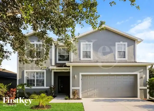 Property at 702 Center Lake St, Lehigh Acres, FL, 33974, 4 beds, 3 baths, [object Object]