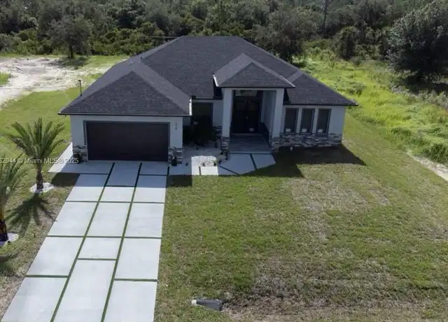 Property at 616 Maple Ave N, Lehigh Acres, FL, 33972, 4 beds, 2 baths, [object Object]