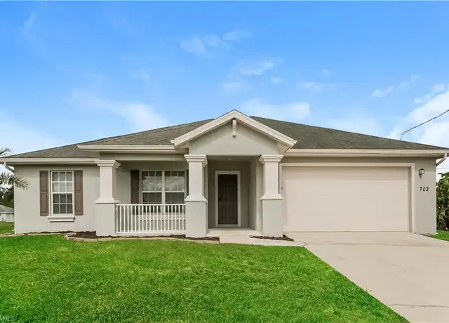 Property at 702 Yvonne Ave N, Lehigh Acres, FL, 33971, 3 beds, 2 baths, [object Object]