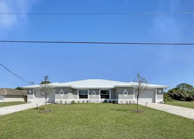 Property at 122 Ivan Ave S, Lehigh Acres, FL, 33973, 3 beds, 2 baths, [object Object]