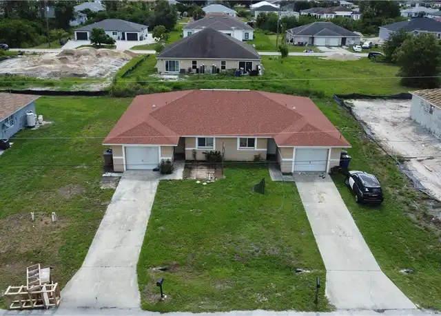 Property at 309 Ivan Ave S, Lehigh Acres, FL, 33973, 3 beds, 2 baths, [object Object]
