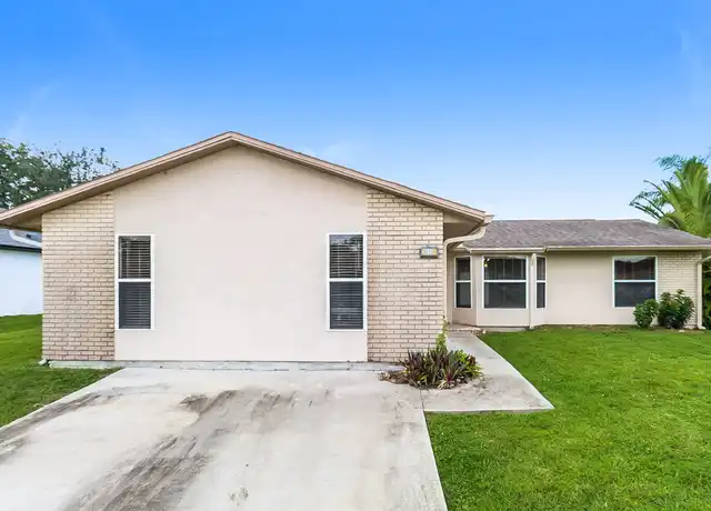 Property at 1807 Vauxhall St NW, Palm Bay, FL, 32907, 4 beds, 2 baths, [object Object]
