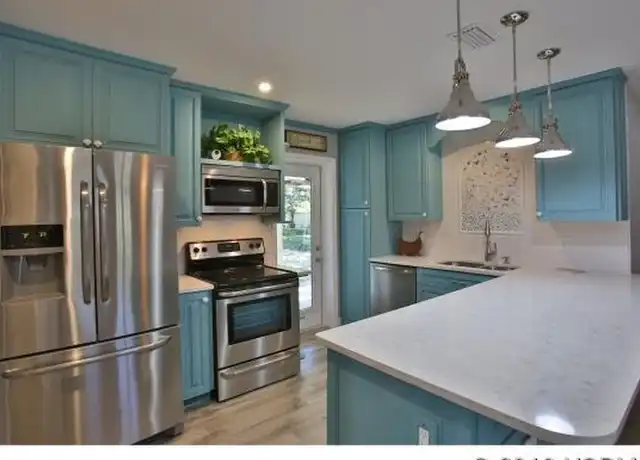 Property at 827 E 11th Ave, New Smyrna Beach, FL, 32169, 4 beds, 2 baths, [object Object]