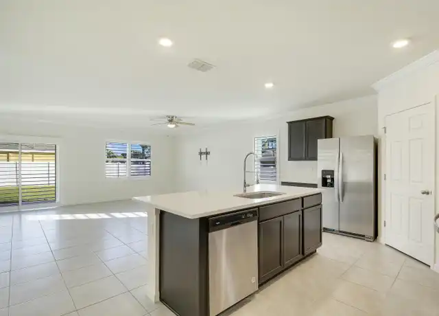 Property at 1455 SW Bartell Ave, Port Saint Lucie, FL, 34953, 4 beds, 2 baths, [object Object]