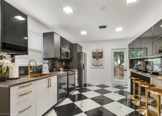 Property at 919 NW 49th St, Miami, FL, 33127, 5 beds, 3 baths, [object Object]