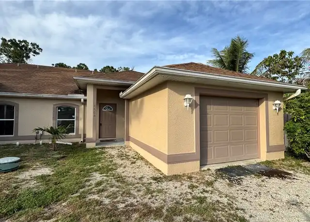 Property at 4604 30th St SW, Lehigh Acres, FL, 33973, 3 beds, 2 baths, [object Object]