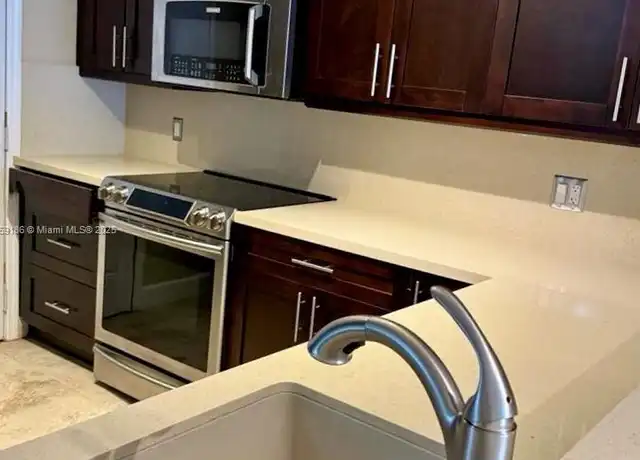 Property at 1400 NE 191st St #105, Miami, FL, 33179, 1 bed, 1.5 baths, [object Object]