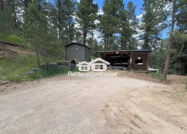 Photo of 7301 Blue Creek Rd, Evergreen, CO 80439