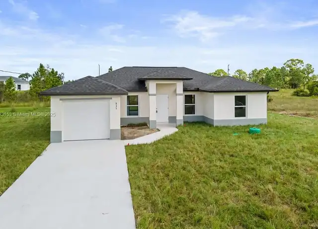 Property at 917 Hepburn Ave, Lehigh Acres, FL, 33974, 3 beds, 2 baths, [object Object]