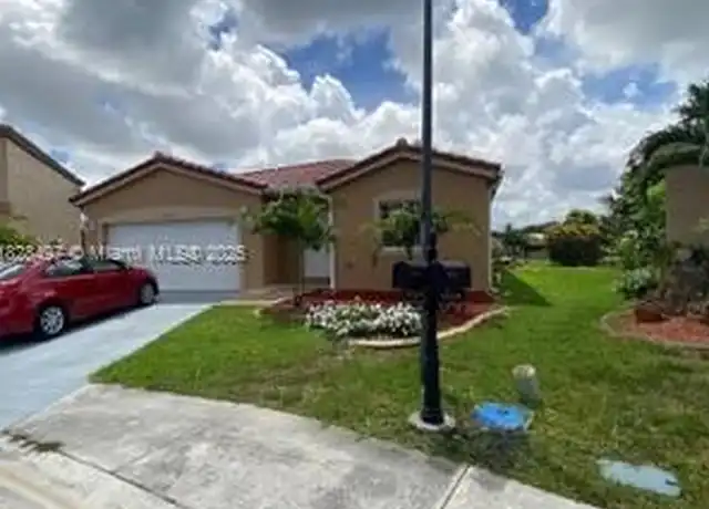 Property at 10242 SW 24th St, Miramar, FL, 33025, 3 beds, 2 baths, [object Object]