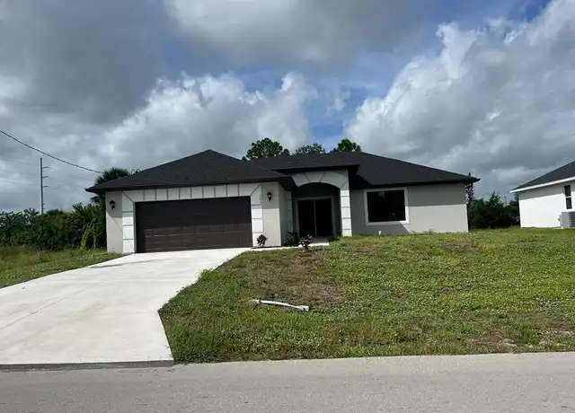 Property at 4010 36th St SW, Lehigh Acres, FL, 33976, 3 beds, 2 baths, [object Object]