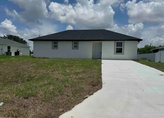Property at 2616 10th St SW, Lehigh Acres, FL, 33976, 3 beds, 2 baths, [object Object]